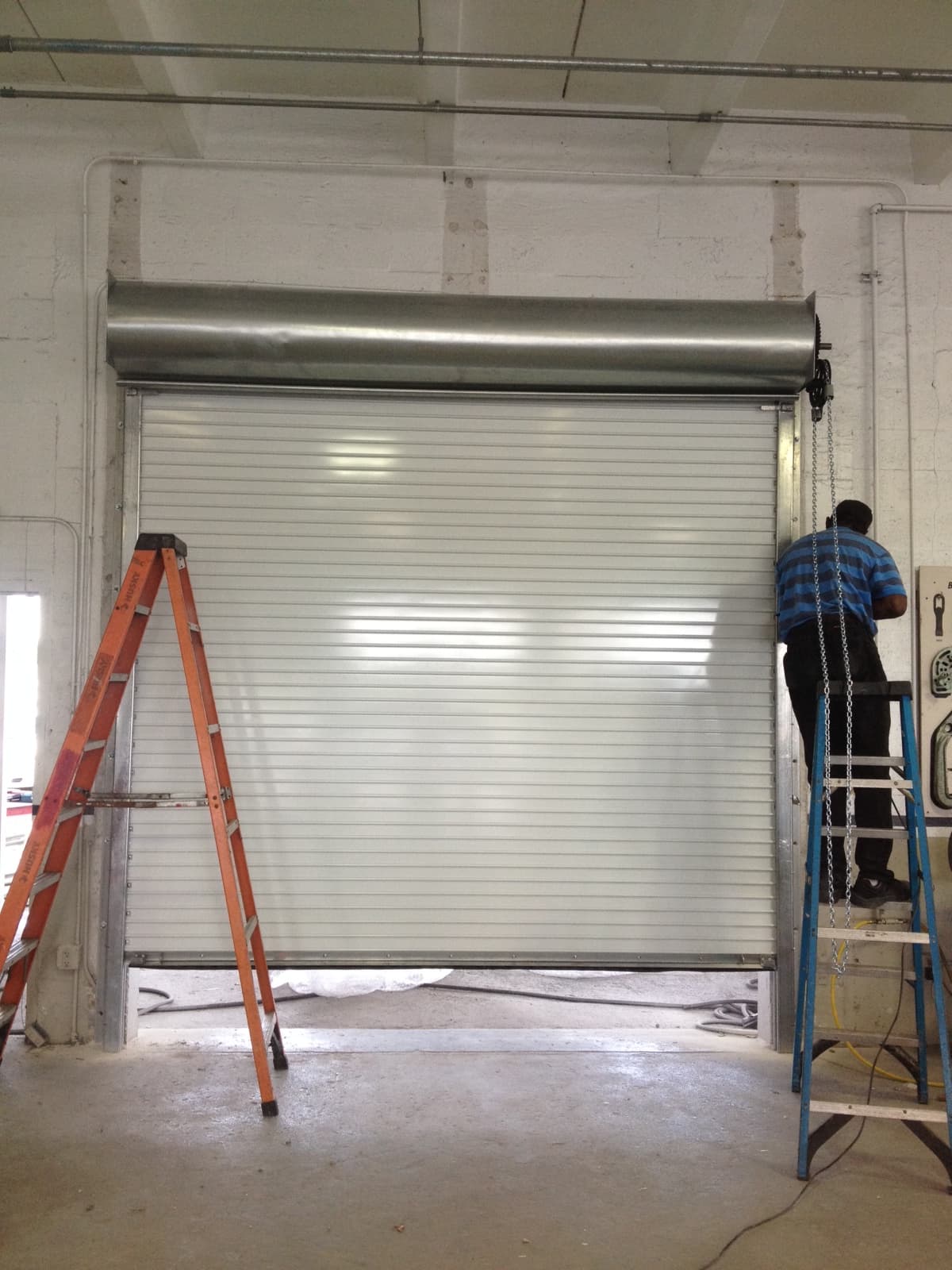 Commercial roll-up door repair team in Boca Raton