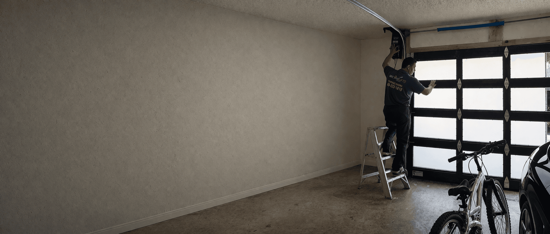 SecureLifts garage door repair technician working on a garage door in South Florida