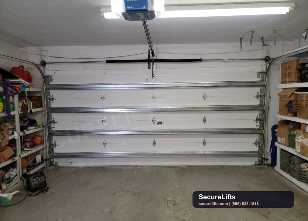 Garage door rollers and track hardware inspection by SecureLifts